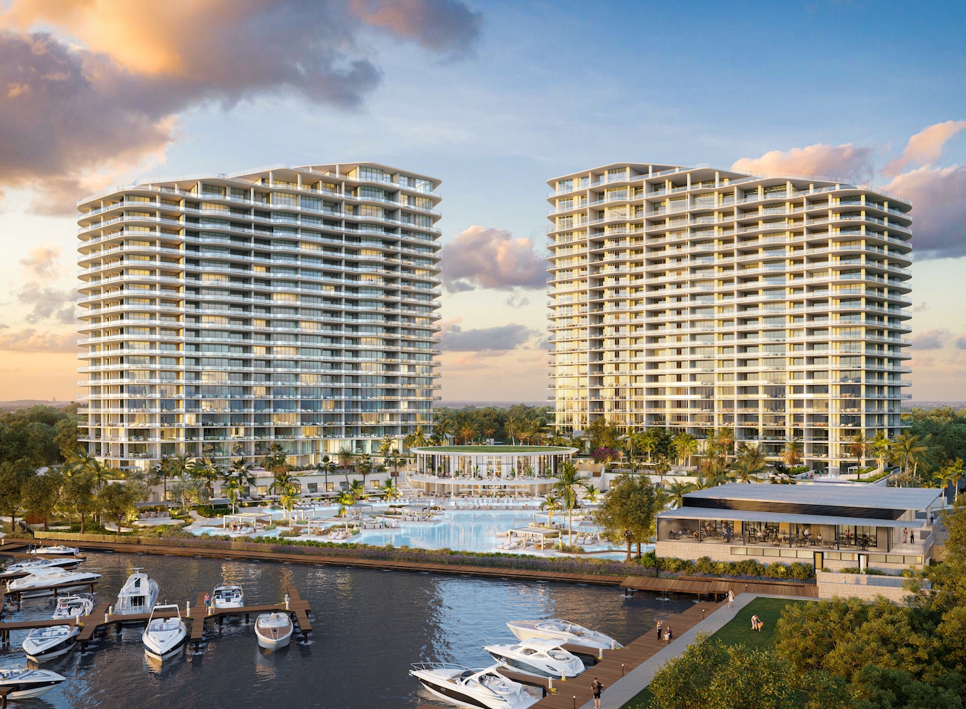 Saltleaf Marina with a waterfront restaurant, residences and a pool in the background